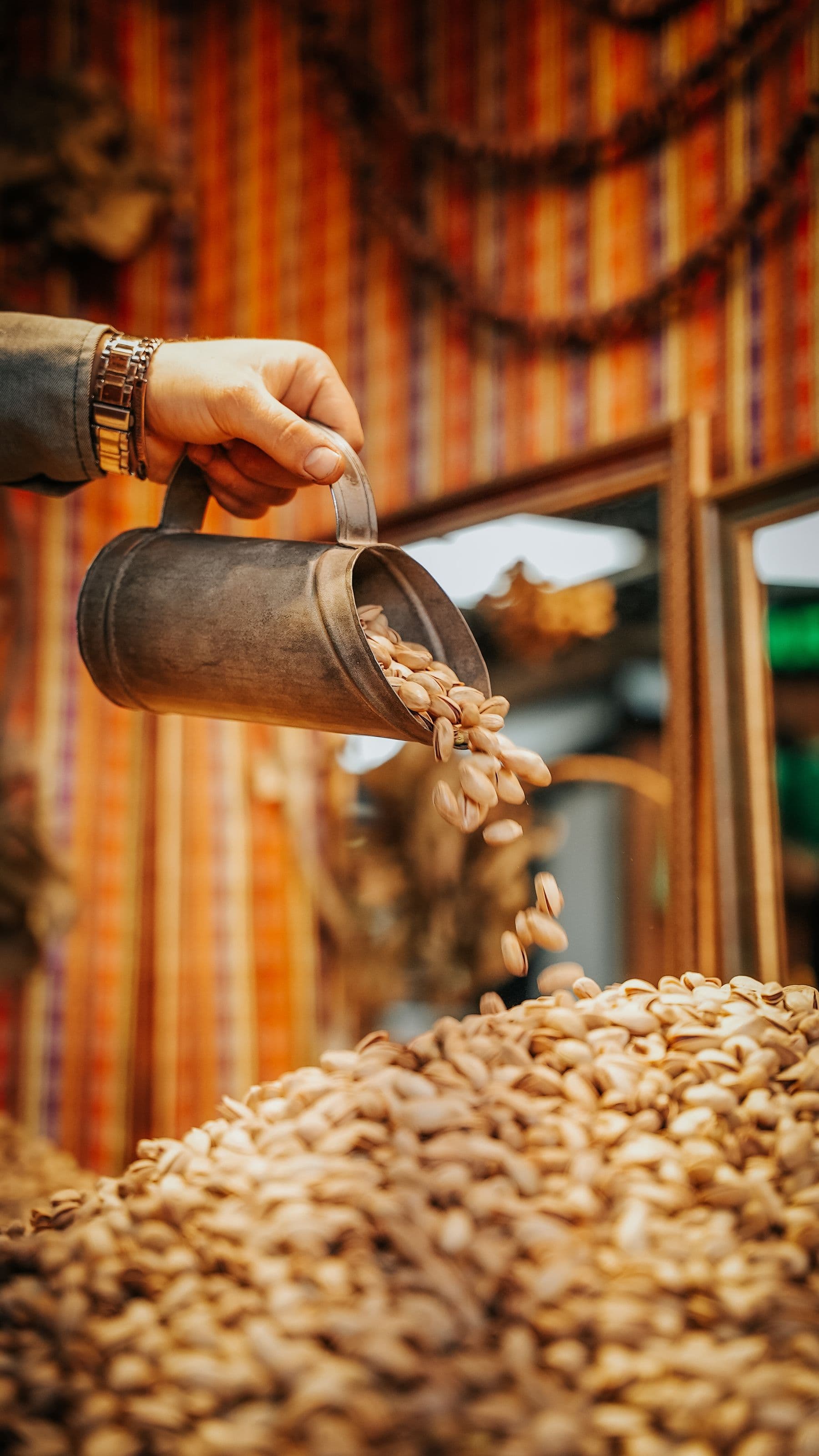 Dry fruits and nuts captured mid-pour